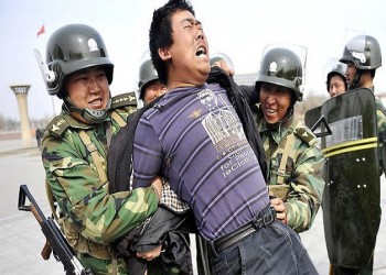 فرنسا تطالب الصين بوقف عمليات الاعتقال الجماعي في شينجيانج