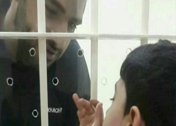 زوجة معتقل بحريني محكوم بالإعدام تستغيث لعلاجه من آلام مبرحة